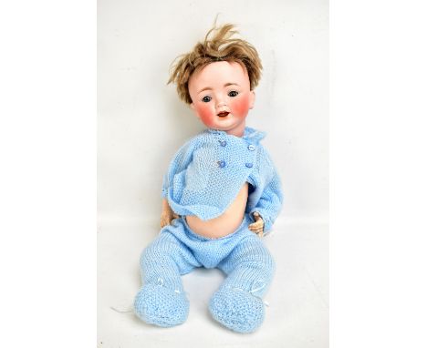 CATTERFELDER PUPPENFABRIK;&nbsp;an early 20th century German bisque headed doll with blonde wig (cut), open/closed blue glass