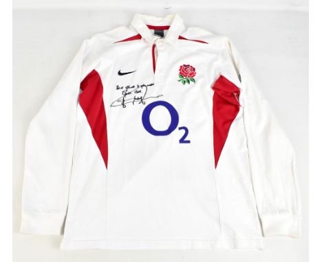 JONNY WILKINSON; a signed England Rugby Nike home shirt, with inscription, size M.