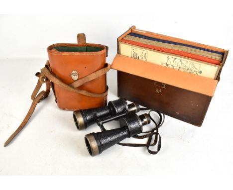 A pair of WWII period German Kriegsmarine binoculars marked BEH 7 x 50, serial no. 463978, fitted in later case, height 21cm,