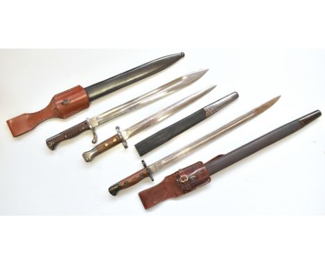 WEYERSBERG KIRSCHBAUM &amp; CIE, SOLINGEN; a WWI Mauser bayonet with metal scabbard, length 52cm, and two further bayonets, o