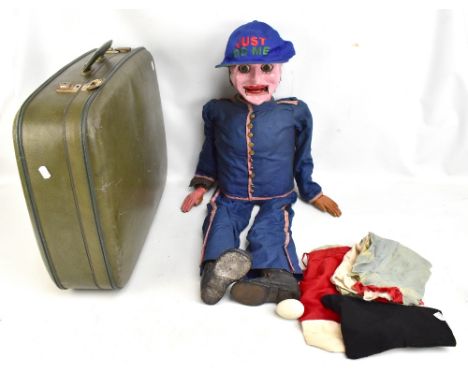 A mid-20th century ventriloquist's dummy in blue outfit (for restoration), length 97cm, and a 'Disappearing Egg' magic trick,