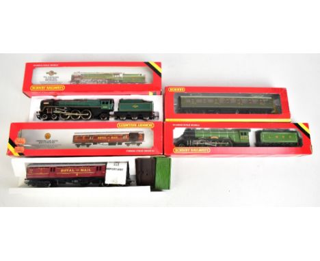 HORNBY; two boxed locomotive and tenders comprising R.063 B.R. Britannia and R.845 L.N.E.R. Flying Scotsman, also two boxed c