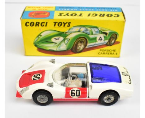 CORGI; a boxed 330 Porsche Carrera 6 in white and red.Additional InformationModel with some light wear, small chip to paint o