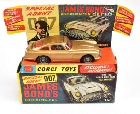 CORGI; a boxed 261 James Bond Aston Martin D.B.5 with two internal figures on pictorial card display with secret instructions