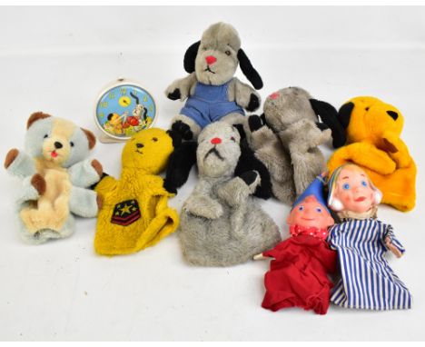 SMITHS; a Sooty alarm clock, the face depicting Sooty and Sweep boxing, height 13cm, and assorted children's puppets and soft