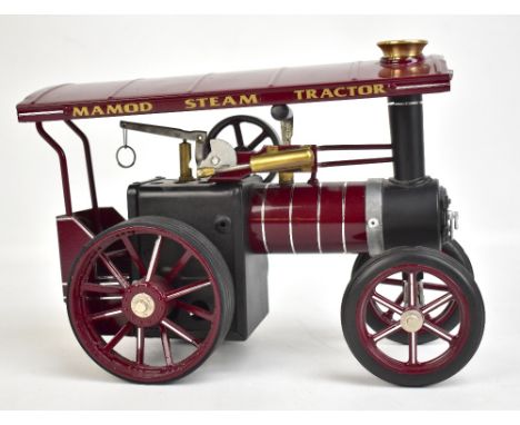 MAMOD; a steam tractor in crimson livery, the scuttle with label to interior inscribed 'www.steam4fun.co.uk engine number 133