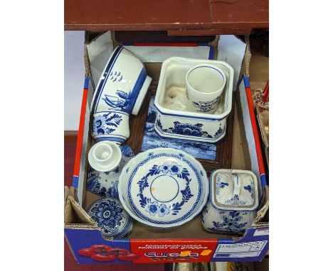 A collection of contemporary Delft pottery, to include candlestick, bowls and tile 