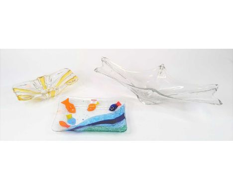 A 20th century clear art glass bowl, of abstract rectangular form, w.58cm; together with another; and an art glass dish decor