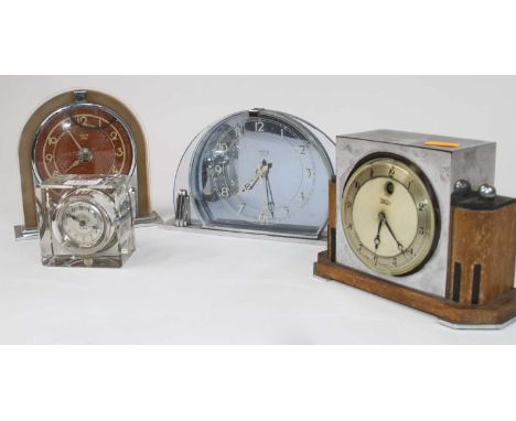 A Smiths Sectric Art Deco mantel clock, having a clear and blue glass case, applied chapter ring showing Arabic markers, stan