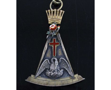 A Victorian silver Masonic jewel, the central eagle with cross above mounted within a compass with scale below, surmounted by