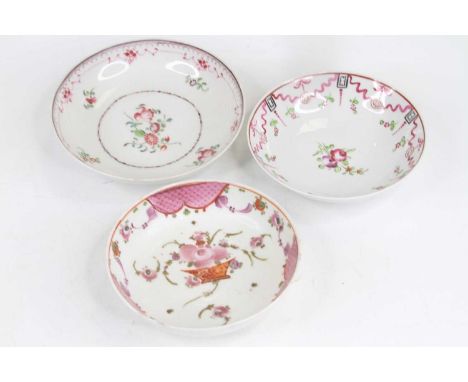 A Lowestoft porcelain saucer, circa 1790, decorated in the manner of Thomas Curtis, dia.12cm, together with two similar Engli