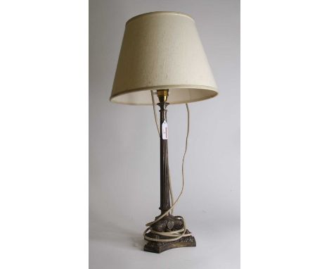 A late 19th century silver plated table lamp in the neo-classical style, having reeded column and acanthus capped support ter