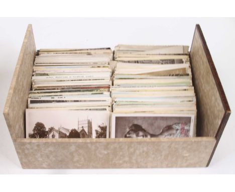 A collection of vintage postcards, to include portraits, architectural and topographical examples 