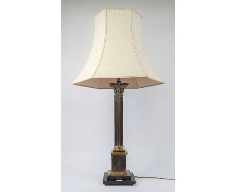 A brass Corinthian column table lamp, mounted to an ebonised stepped wooden plinth, h.70cm (excluding fittings)