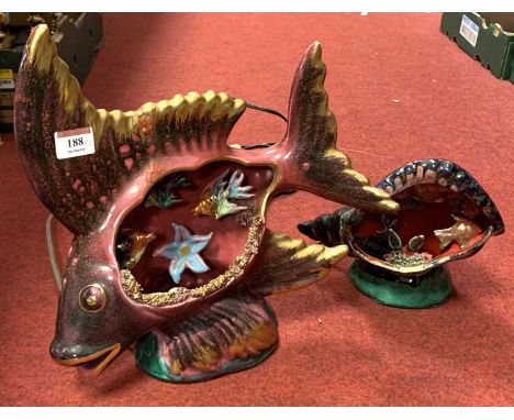 A novelty pottery table lamp in the form of an angel fish, h.32cm; together with another smaller in the form of a shellBoth r