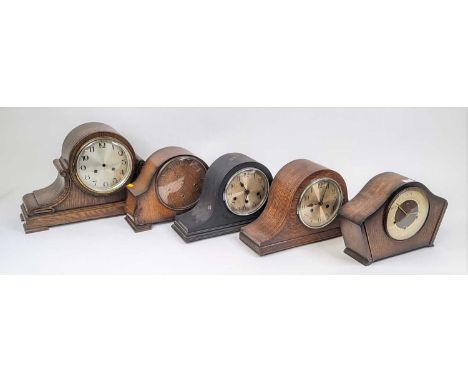 A Smiths Art Deco oak cased mantel clock, the painted metal chapter ring having applied Arabic markers and chime/silent contr