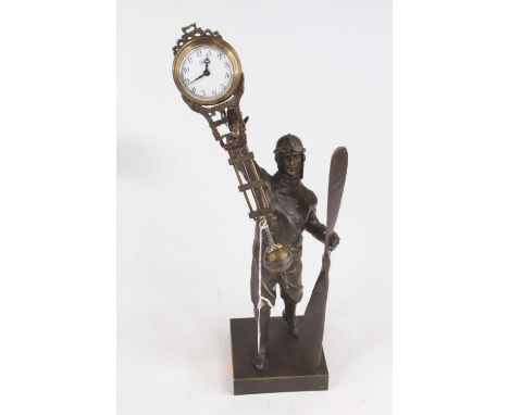 A figural Aviator bronzed mystery clock, h.38cm 
