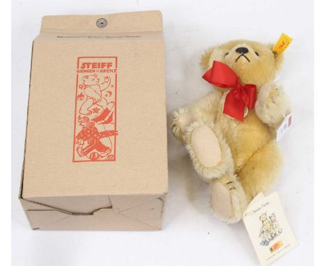 A Steiff blond mohair 'Classic' teddy-bear, having buttoned and opposable limbs, approx h.25cm, boxedNo damage to bear. Growl