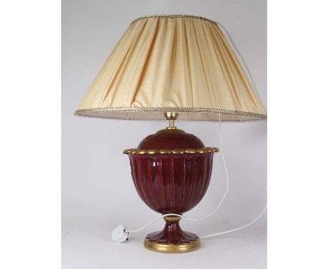 A red and gilt glazed pottery table lamp in the form of an urn, h.33cm (excluding fittings)Requires new plug and PAT test.App