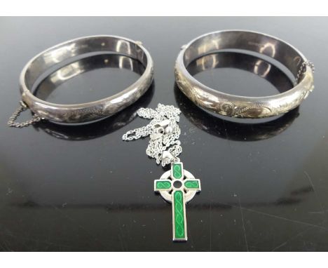 Two silver hinged bangles; together with a silver and enamel Celtic Cross pendant on finelink neck chain (3)