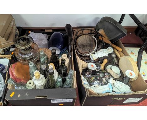 Two boxes of ceramics and glassware to include continental porcelain figures, glass oil lamp and shade, green glass bottles 