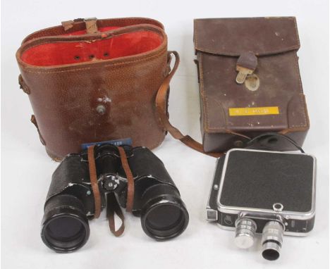 A pair of vintage Omega 7x50 field binoculars; together with a vintage Meopta video camera, cased (2)