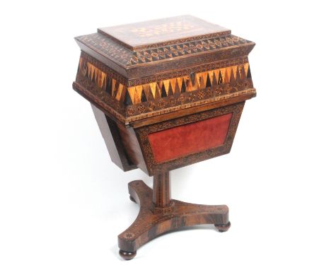 A rare Tunbridge ware rosewood sewing table by William Burrows, the triform base raised on bun feet and with circles and band