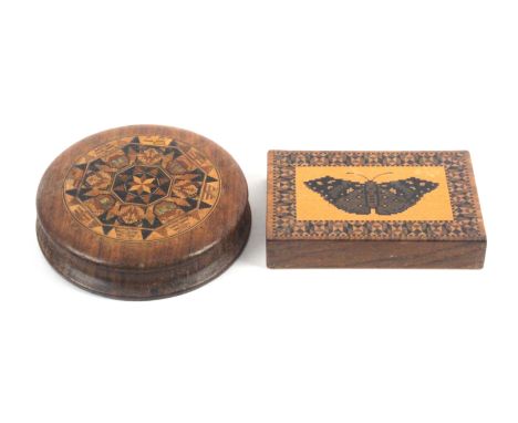 Two Tunbridge ware paperweights, comprising a rosewood rectangular example, the centre inset with a mosaic panel of a butterf