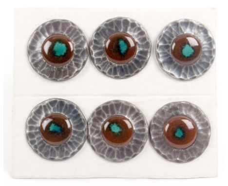 A set of six Arts and Crafts period buttons, with Ruskin style ceramic centres each marked to reverse 'The Guild Button NSES 