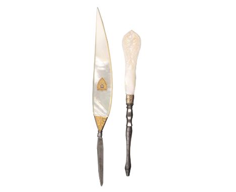 A Palais Royal seal lifter or eraser and another tool, the first with mother of pearl handle with gilt metal and enamel shiel