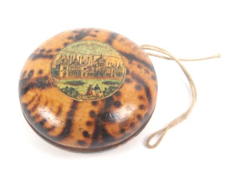 A rare early Tunbridge ware yo-yo, burnt to simulate tortoiseshell, one side with a circular colour print titled 'Brighton Pa