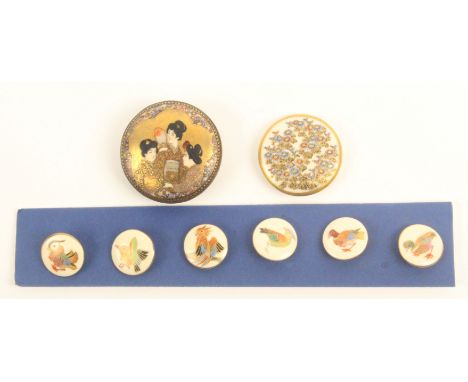Seven Satsuma porcelain buttons and a plaque, comprising a large floral Satsuma button, 4.6cms dia., a similar figural plaque