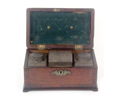 An early George III mahogany, crossbanded and chevron inlaid tea caddy, the interior fitted with three tin cannisters, 25 x 1
