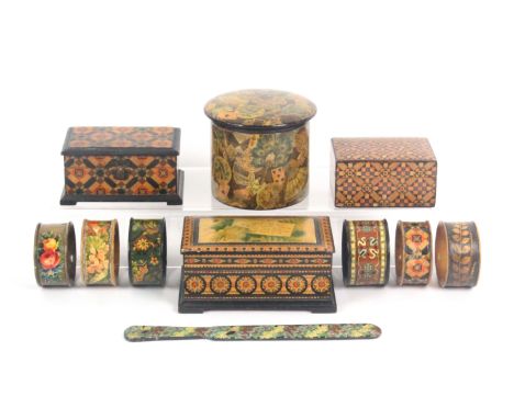 Mauchline ware - eleven pieces in 'alternative finishes', comprising a dome top cylinder powder box (playing cards/fans), 8cm