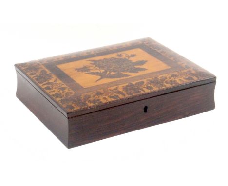 A Tunbridge ware rosewood writing box, of rectangular form, the plain concave sides below a hinged lid inset with a mosaic fl