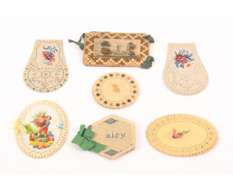 Bristol card needle books and covers, comprising an oval example with watercolour panel of an exotic bird, 9cms, another in t