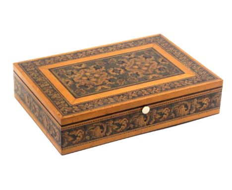 A Tunbridge ware box by Edmund Nye, of rectangular form, the pale wood ground with a broad band of scrolling mosaic to the si