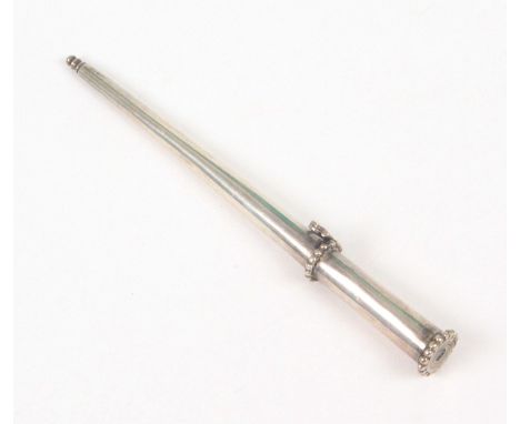 A late 18th Century Dutch silver knitting stick, of tapering cylinder form with two beaded collars, the lower with hinged loo