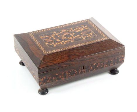 A rosewood Tunbridge ware fitted sewing box of small sarcophagol form, raised on four bun feet, the sides with a band of stic