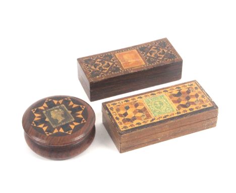 Three Tunbridge ware stamp boxes, comprising an unusual turned rosewood circular example, the lid in stick ware with 'penny b