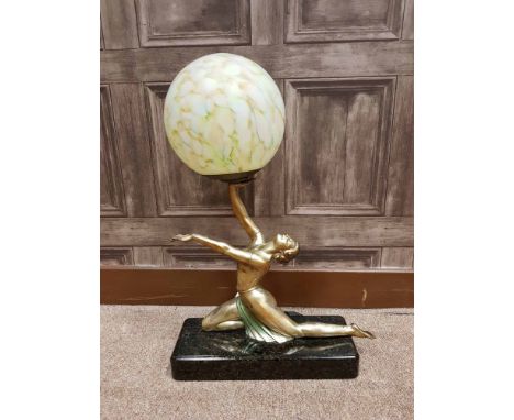 ART DECO FIGURAL TABLE LAMP the figure is period of gilded spelter, modelled as a semi-nude female dancer, set on a later bla