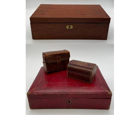 A pair of vintage French binoculars in a tooled and gilt leather case, and two leather jewellery or trinket boxes, along with