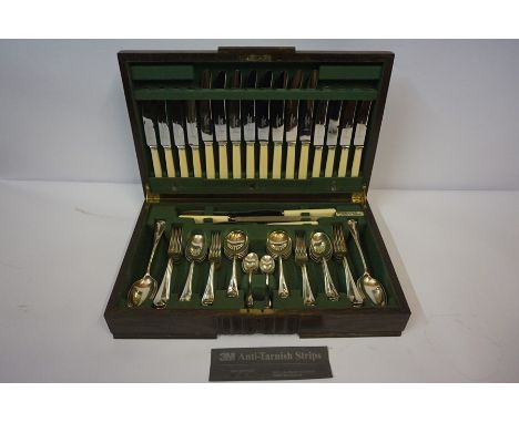 Canteen of Silver Plated Cutlery, Having label for Wilson &amp; Sharp Ltd Edinburgh, cased in oak