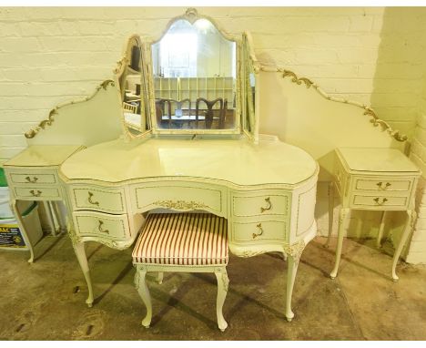 French Style Cream Five Piece Piece Bedroom Suite, Comprising of two five drawer serpentine chests of drawers, dressing table