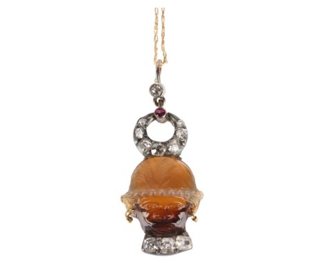 A 19th century banded agate diamond ruby Blackamoor pendant necklace, the banded agate relief carved depicting bust facing fr