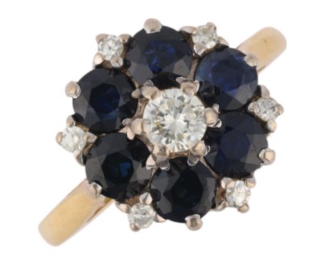 An 18ct gold sapphire and diamond snowflake cluster ring, set with round-cut sapphires and round-cut diamonds, total diamond 