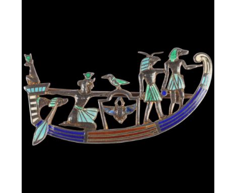 An Art Deco Continental silver-gilt enamel Egyptian Revival brooch, maker GK, depicting Egyptian figures on a boat, 40.3mm, 4
