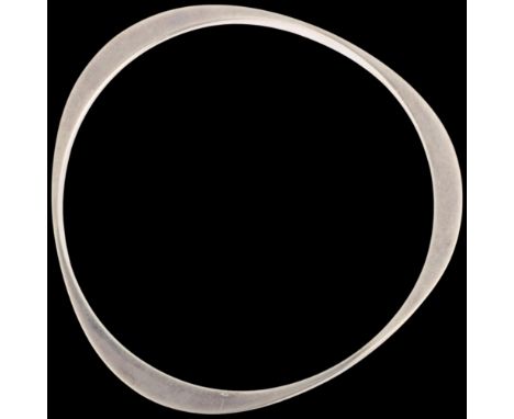 A modernist sterling silver slave bangle, maker SBV, London 2015, band width 2.4mm, internal circumference 20cm, 21.2g . Cond
