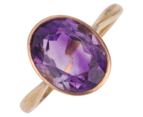 An Antique 9ct gold single stone amethyst ring, maker AH & S, rub-over set with oval mixed-cut amethyst, setting height 10.7m