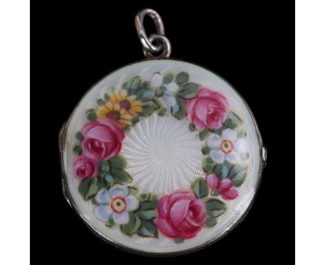 A Norwegian silver enamel 'Floral Wreath' locket pendant, circular form, with hand painted watercolour flowers on engine turn